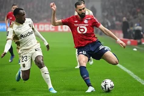 Foto editorial untuk berita Lille Puncaki Klasemen Liga Prancis, PSG Terpuruk di Posisi Tujuh